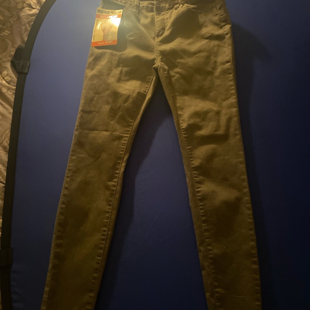 Green tight fitting jeans